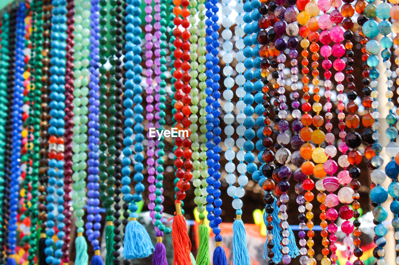 Colorful gemstone rosary on indian market in goa