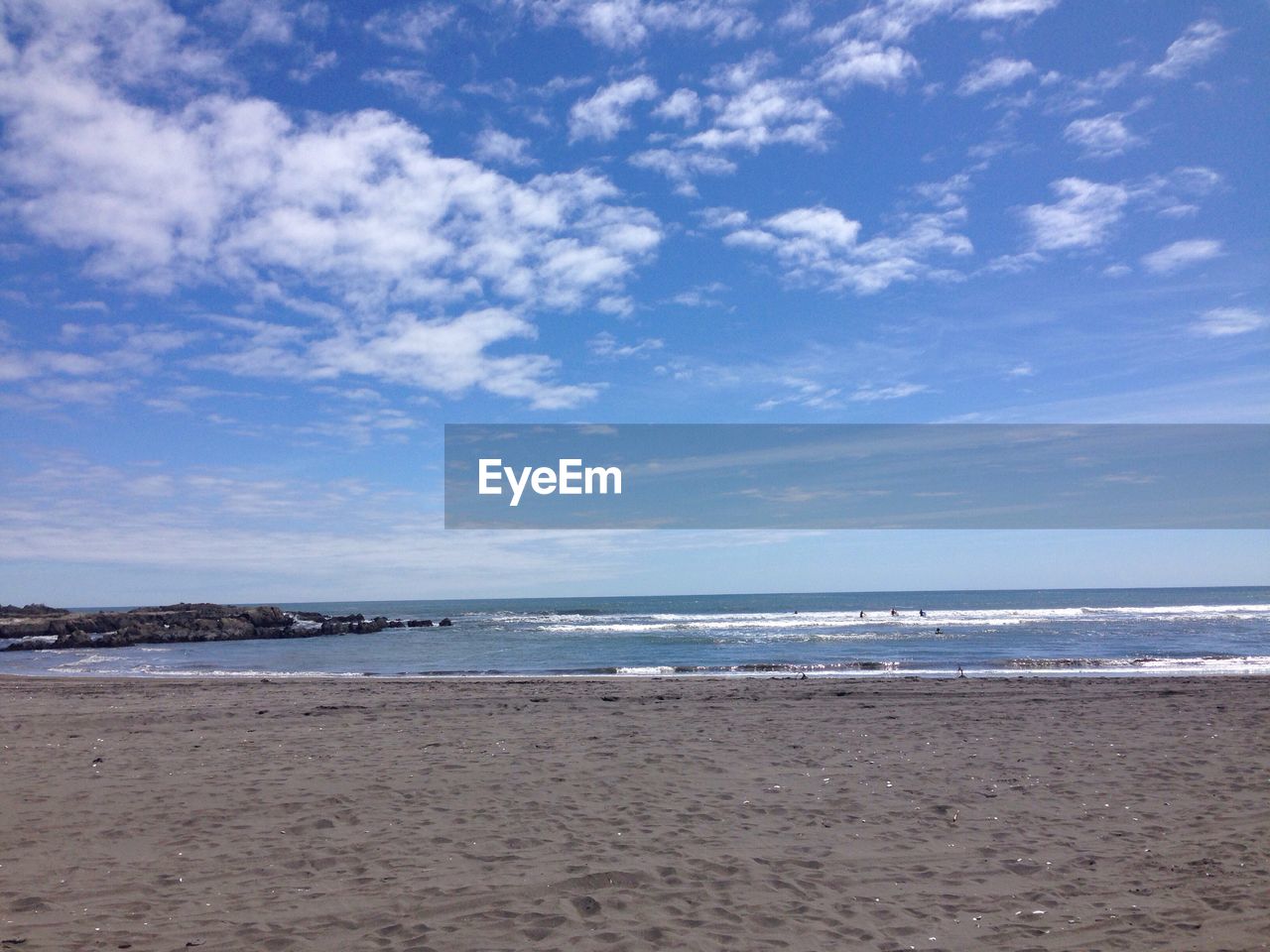 Scenic view of beach against sky