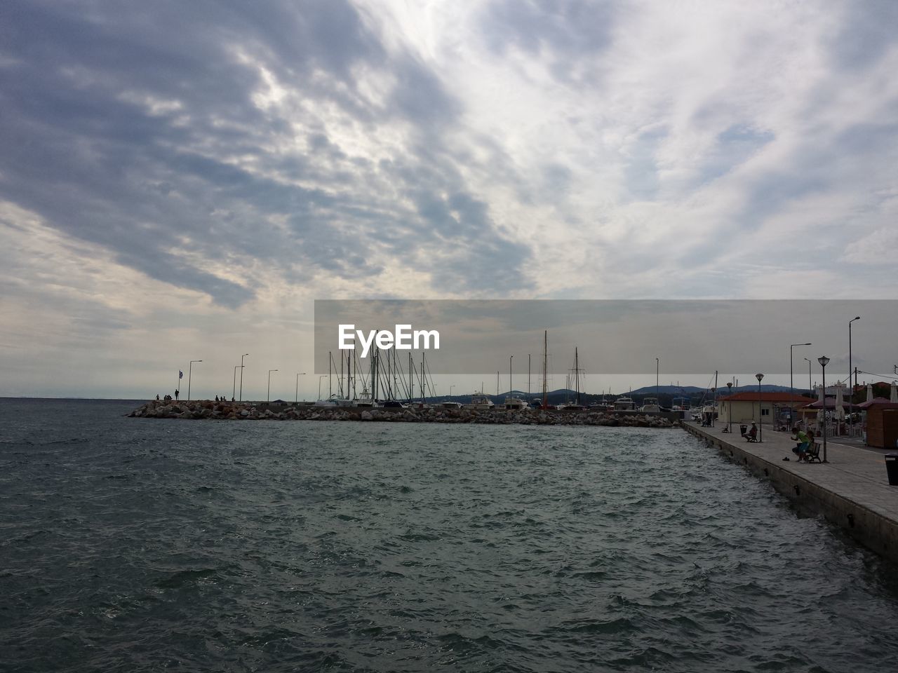 VIEW OF SEA AGAINST CLOUDY SKY