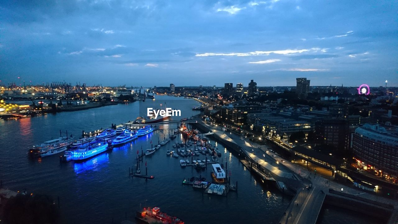 High angle view of boats moored at harbor