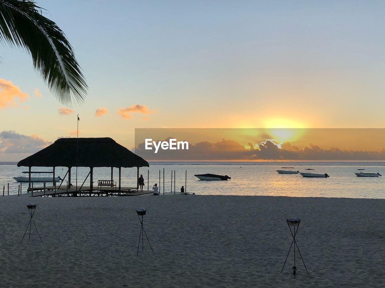 SCENIC VIEW OF SEA AT SUNSET