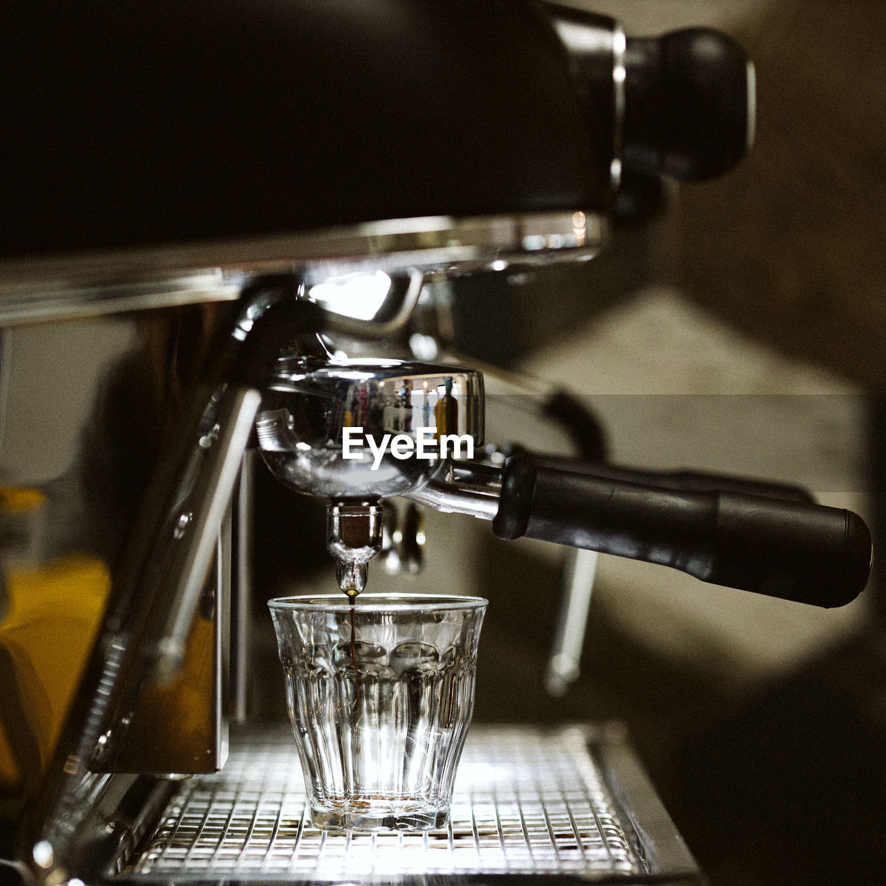 Close-up of a machine making an espresso