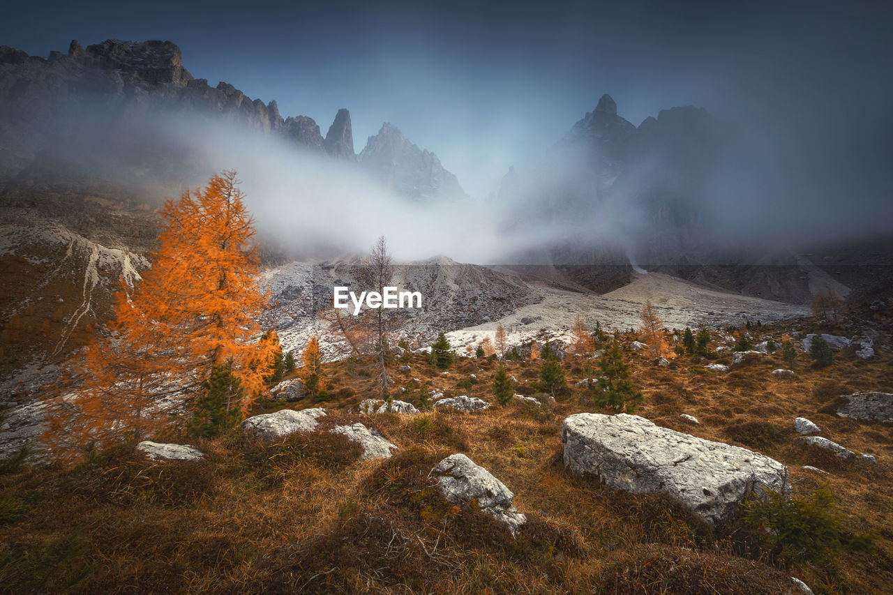 Scenic view of mountains against sky during winter