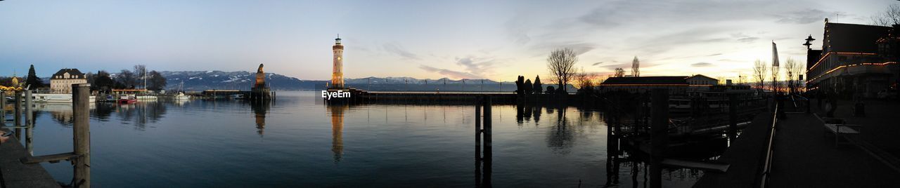 Panoramic view of lindau lighthouse on lake against sky