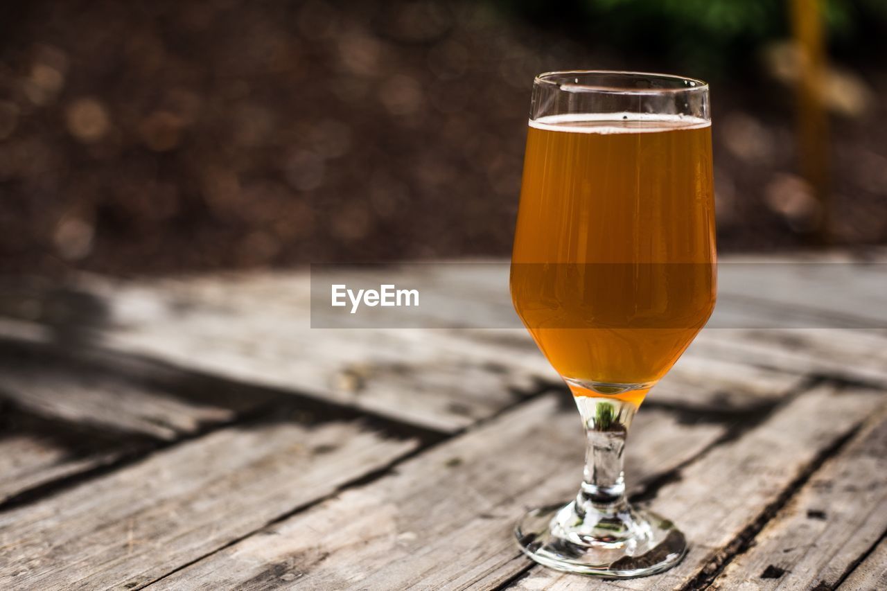 Close-up of beer glass on table