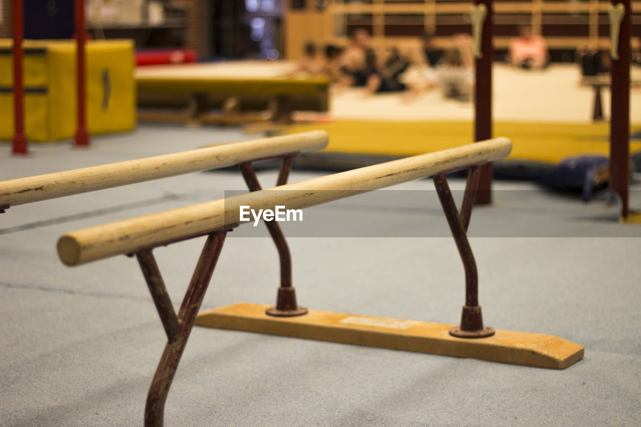 Close-up of parallel bars at gym