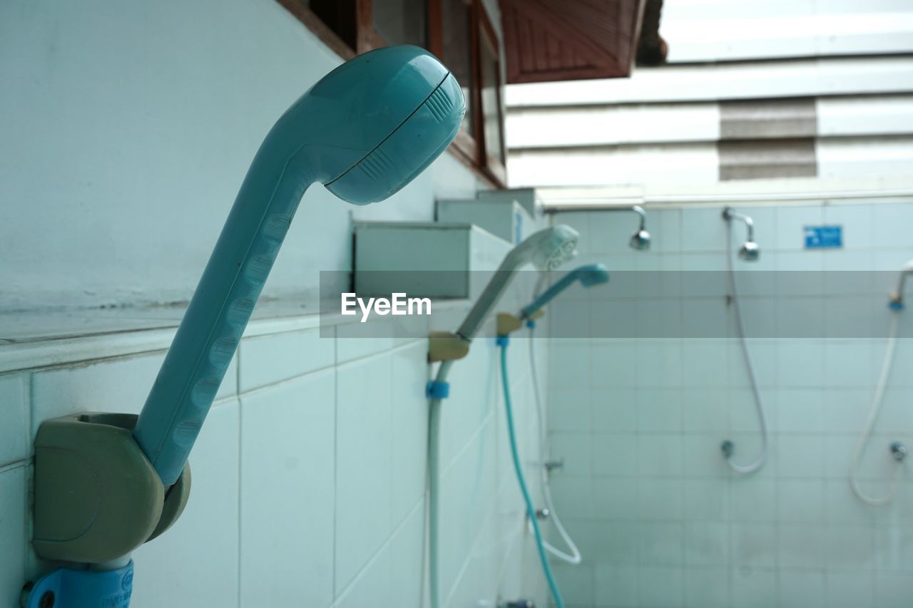 CLOSE-UP OF FAUCET ON BATHROOM