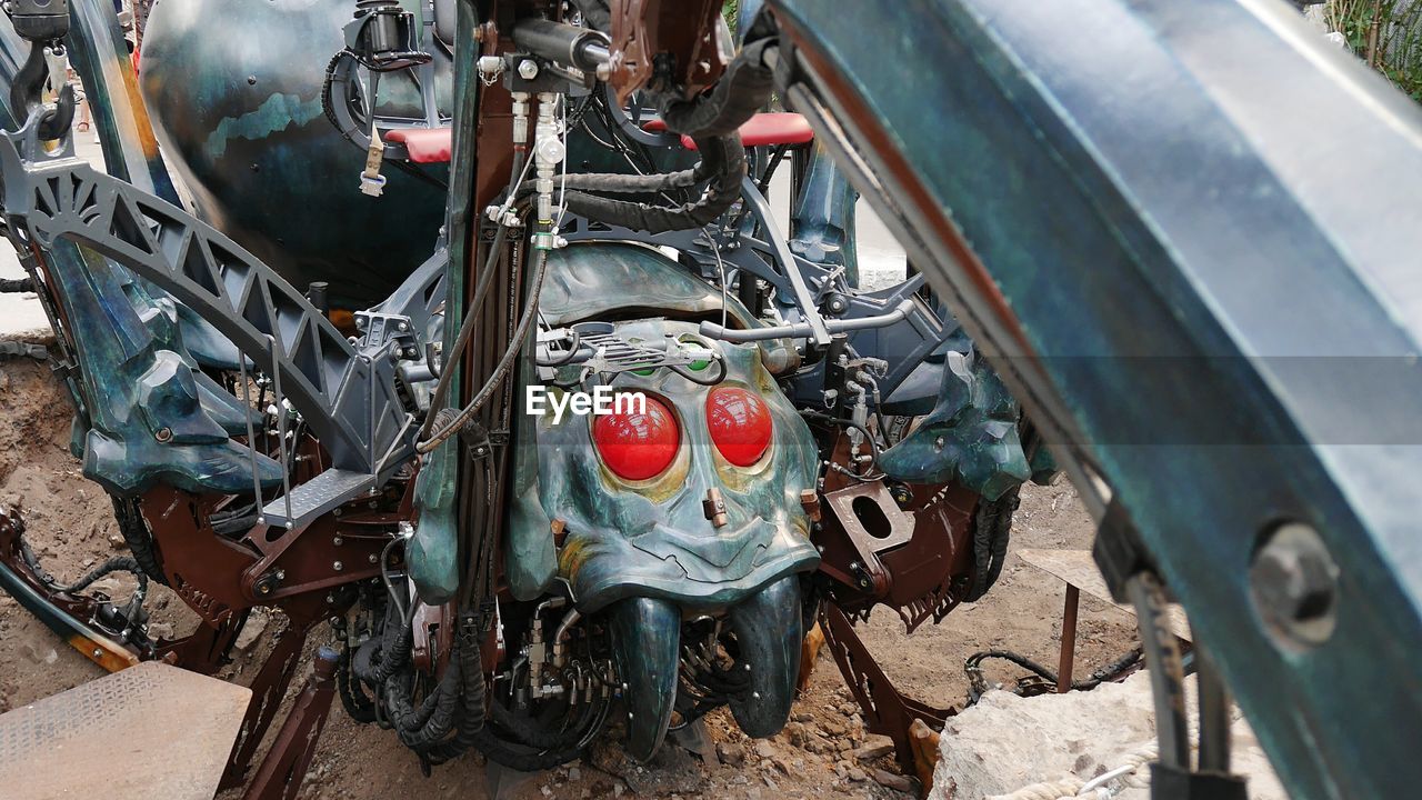 CLOSE-UP OF VINTAGE CAR ON MOTORCYCLE