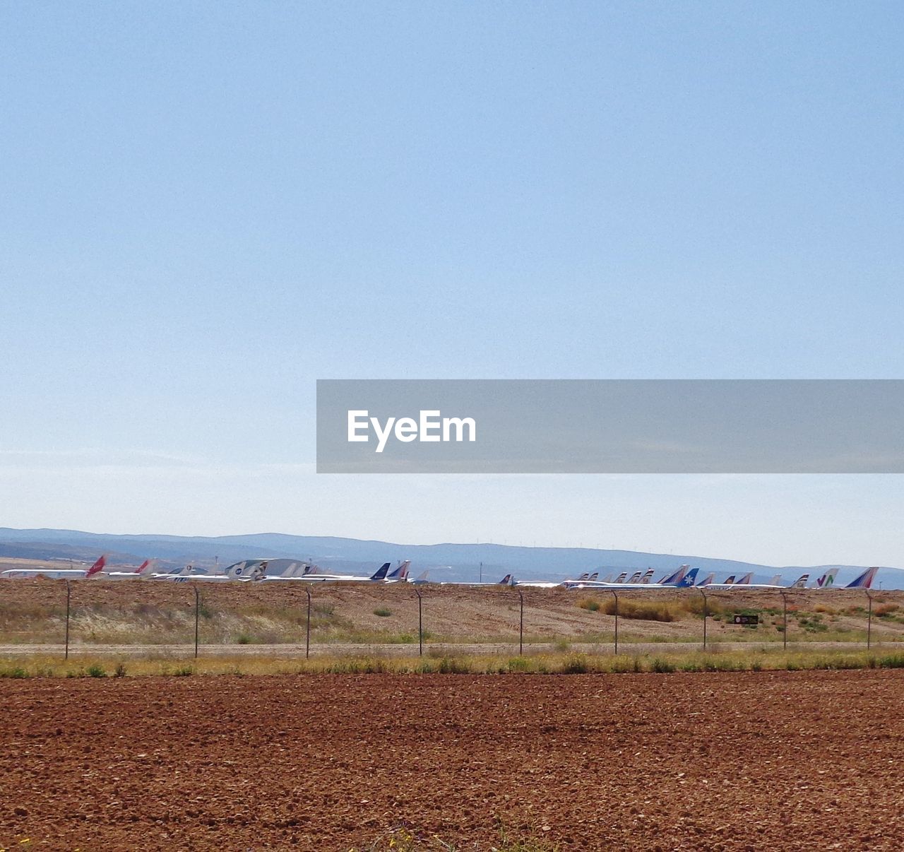 SCENIC VIEW OF FARM AGAINST SKY