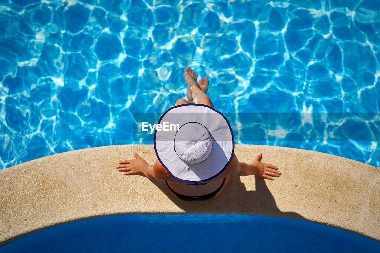 High angle view of woman at swimming pool