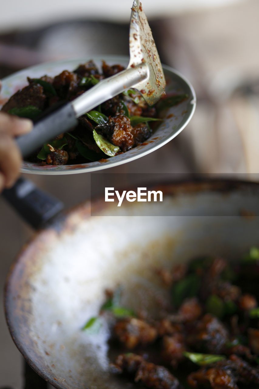 Close-up of food in cooking pan