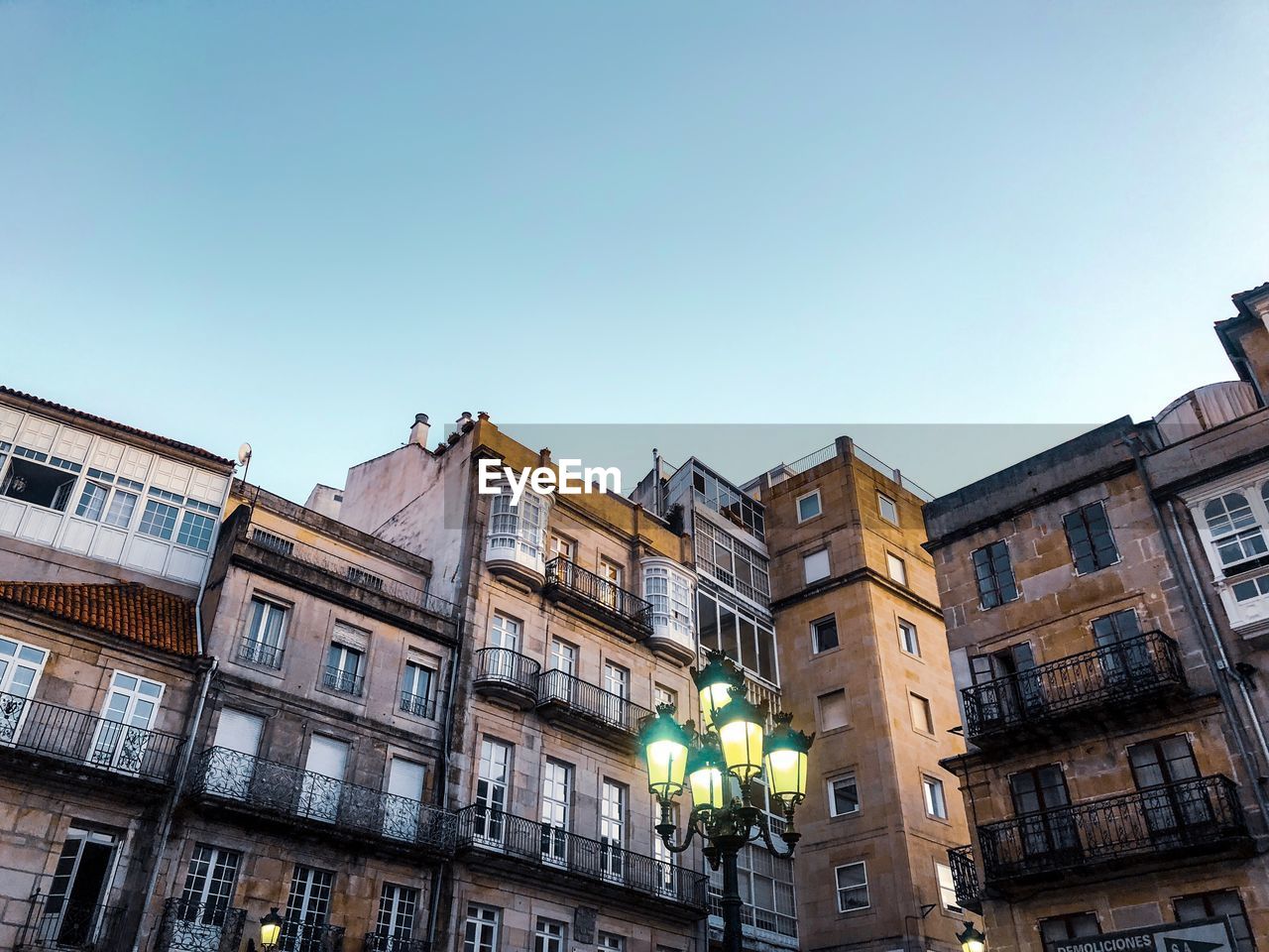 Low angle view of buildings against clear sky