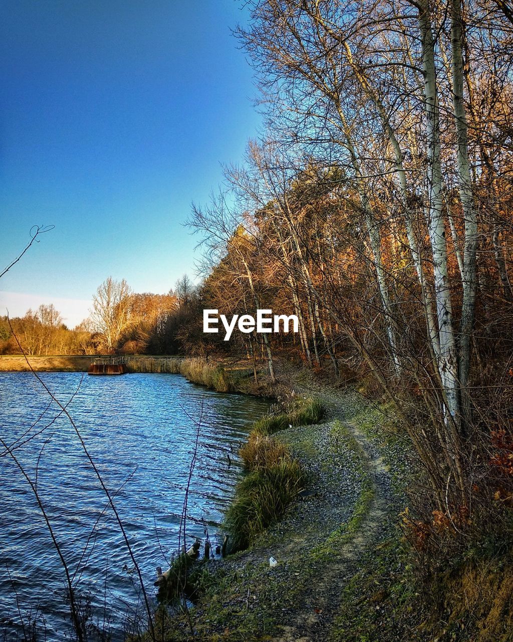 VIEW OF RIVER AGAINST CLEAR SKY