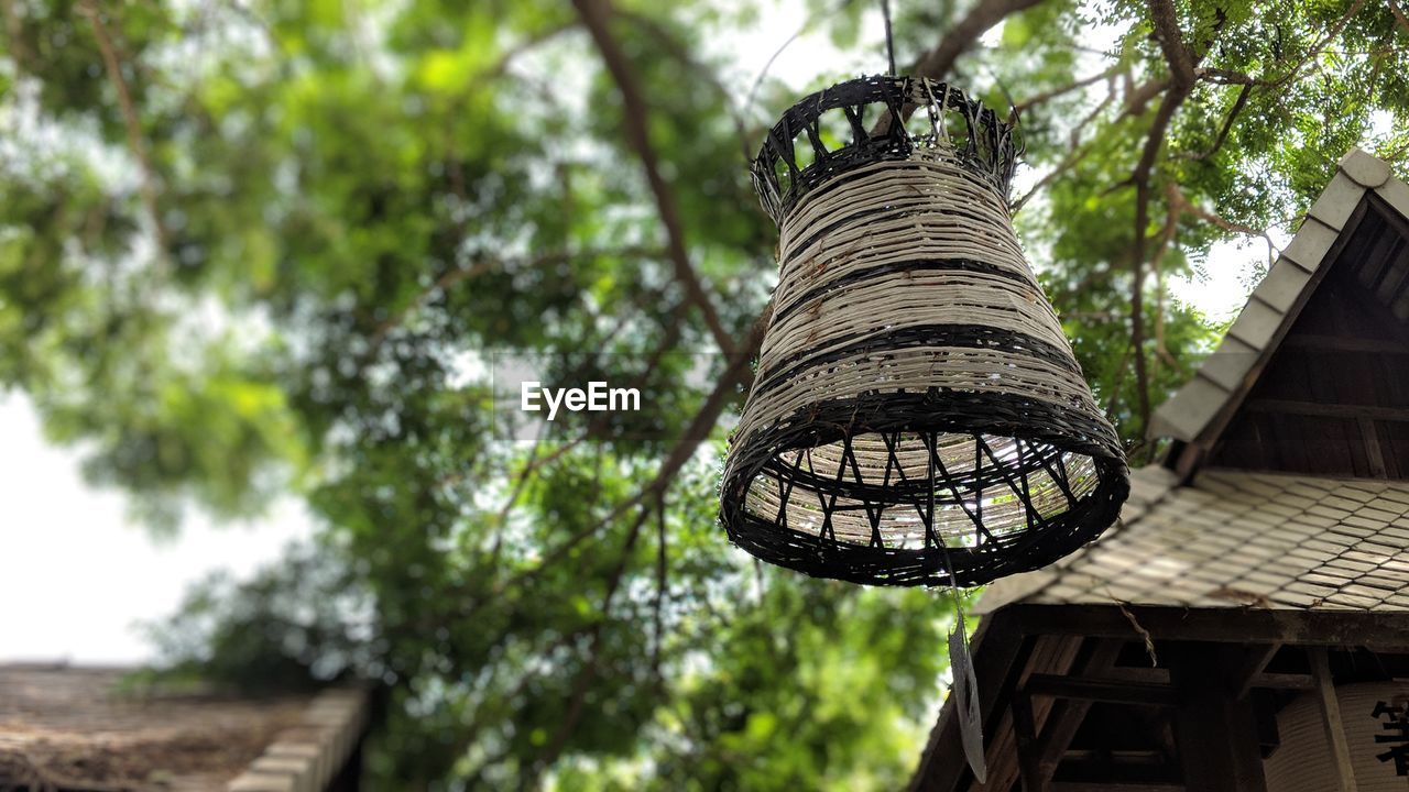 Low angle view of lantern and traditional building
