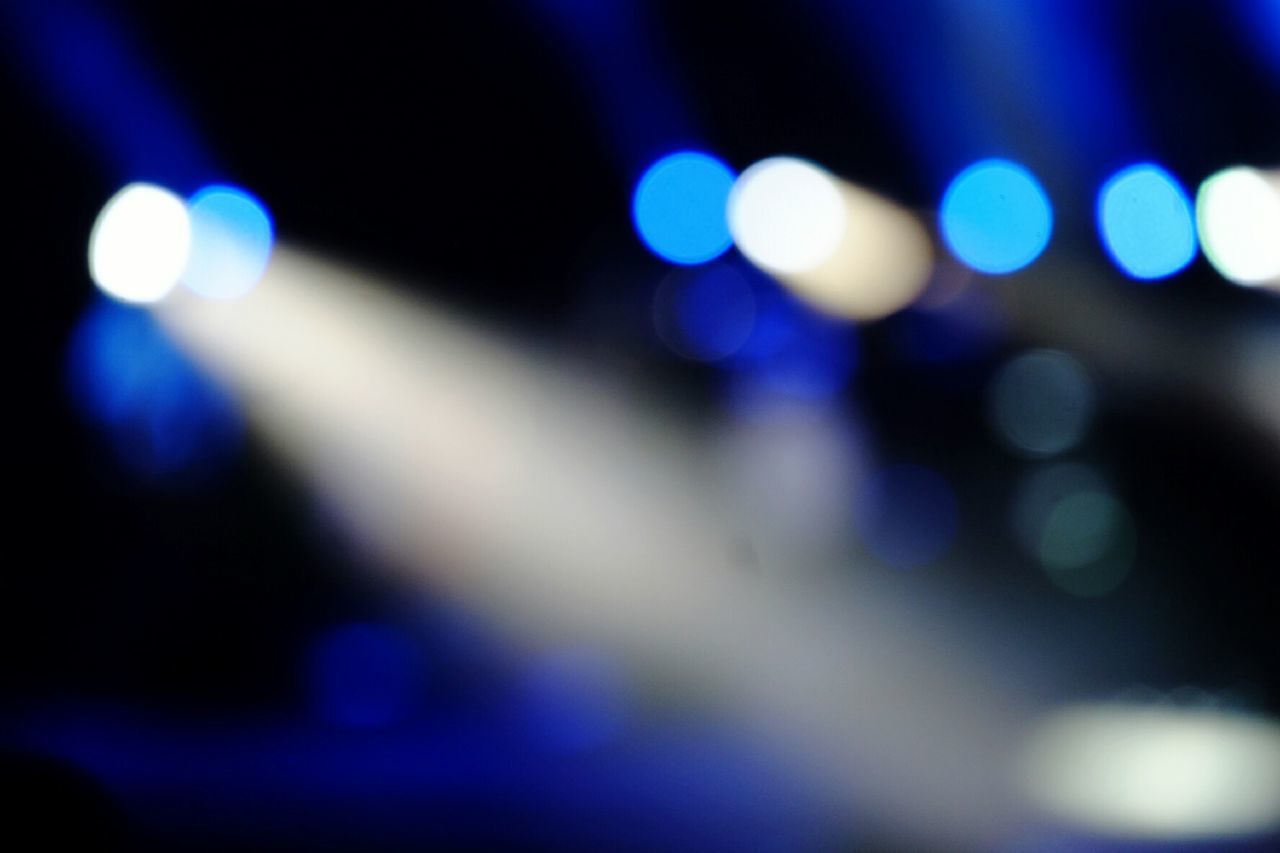 Defocused image of illuminated lights at nightclub