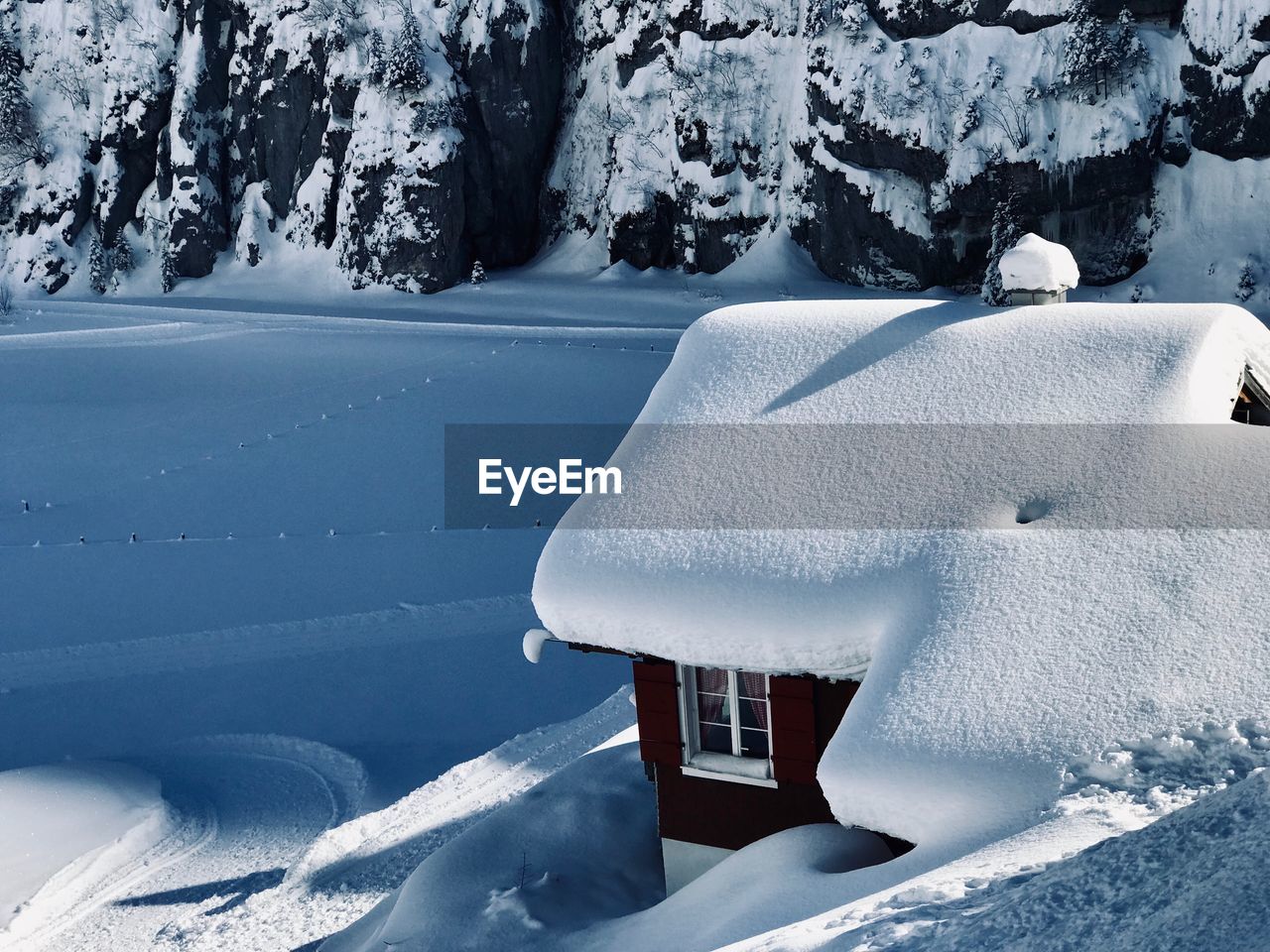 High angle view of house on snow covered land