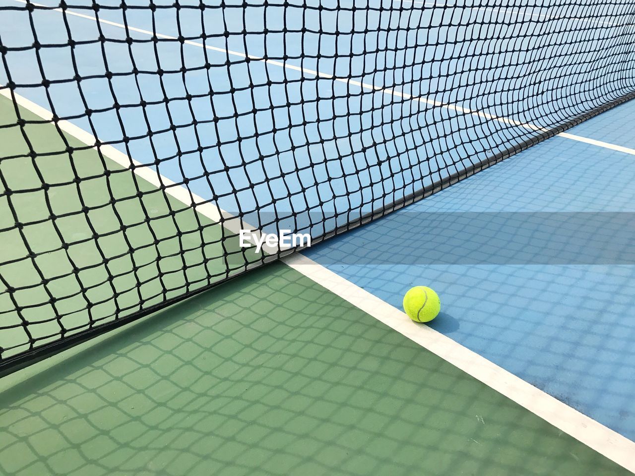 High angle view of tennis ball on field at court