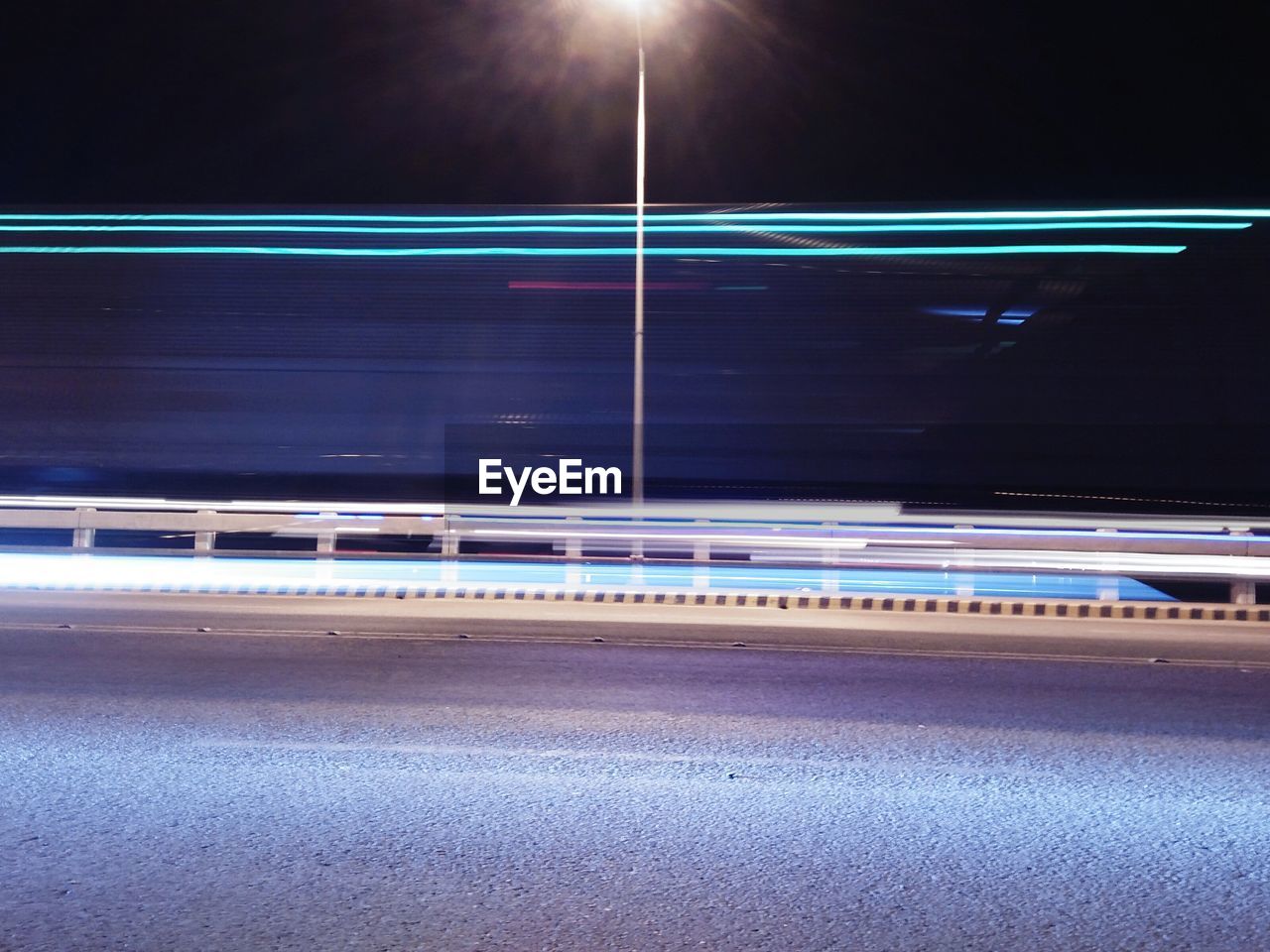 Light trails on road at night