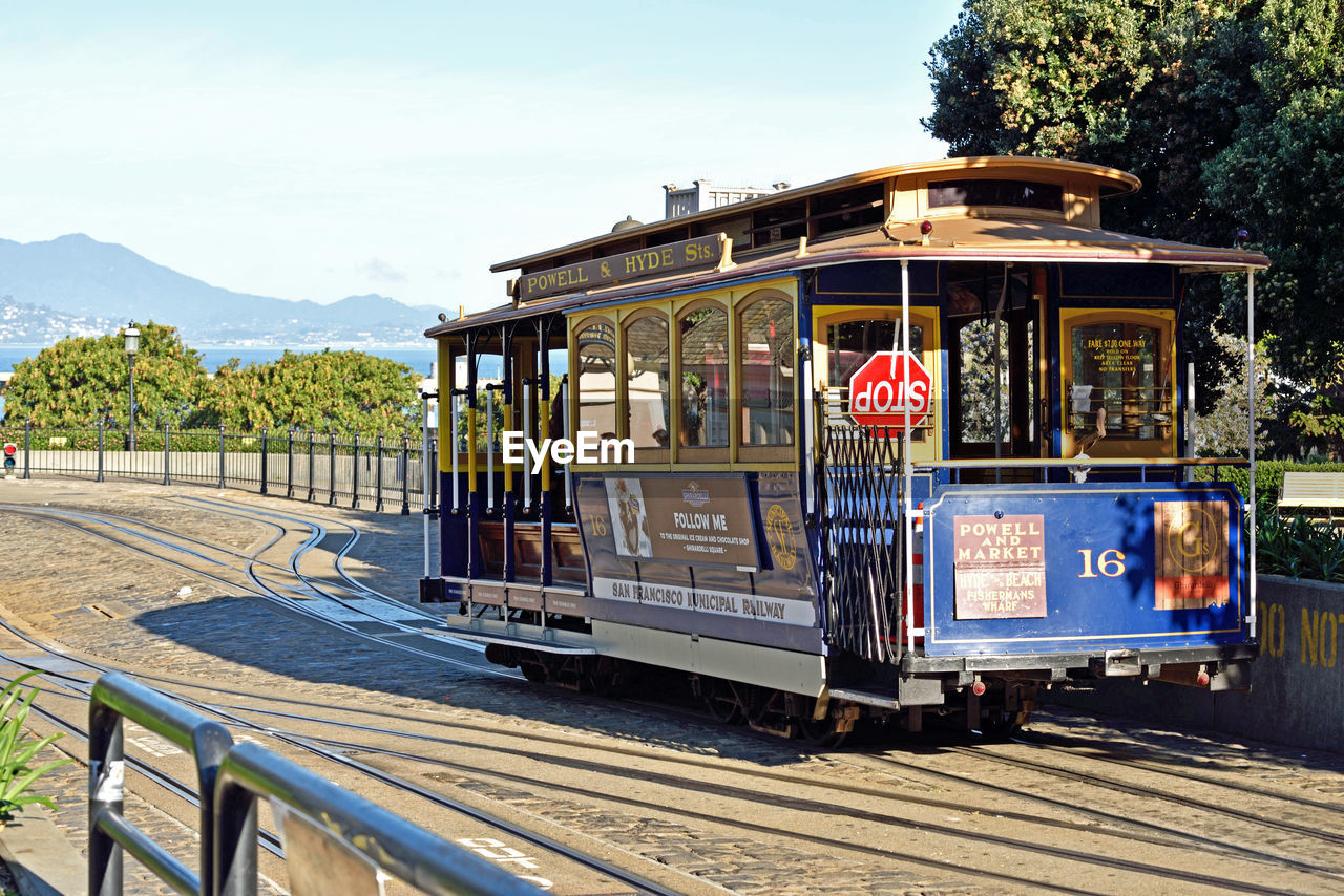 Cable car on railroad tracks