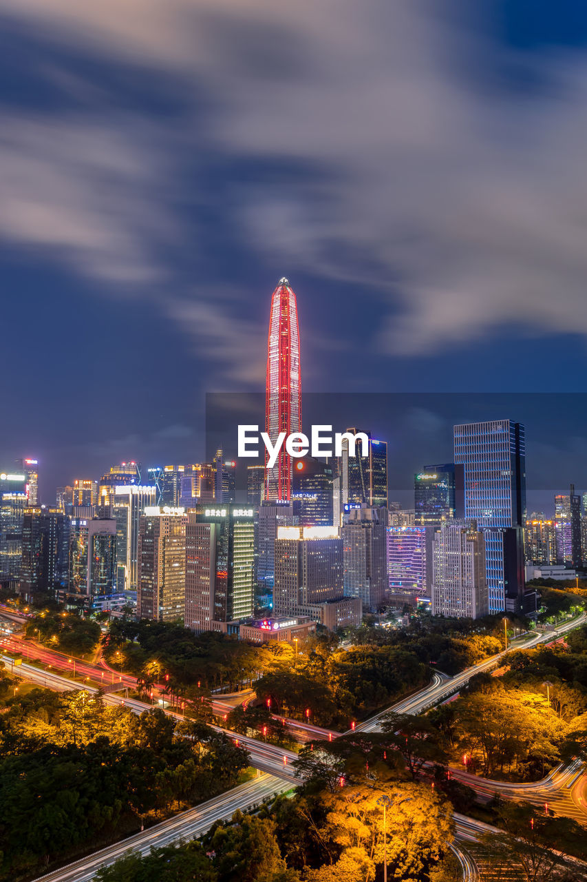 High angle view of illuminated buildings in city against sky