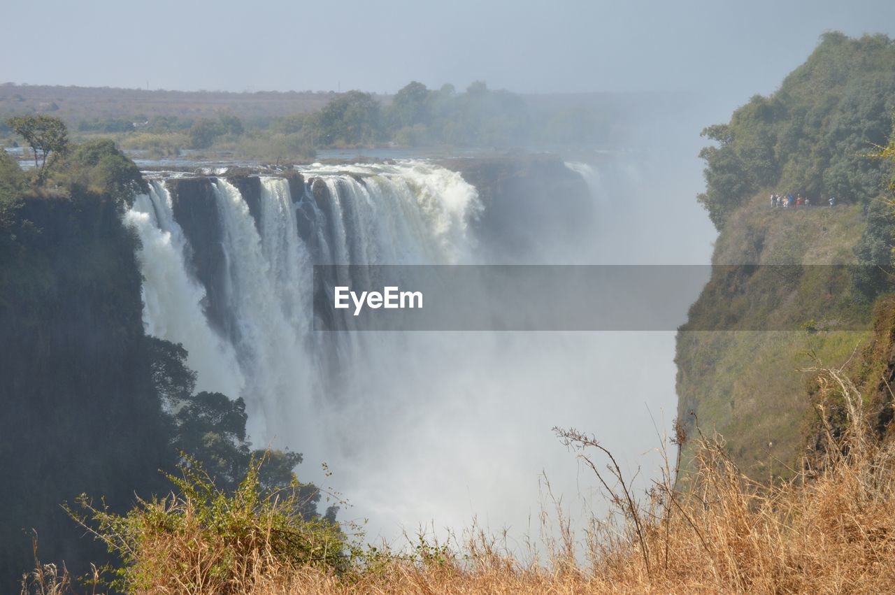 Scenic view of victoria falls against clear sky