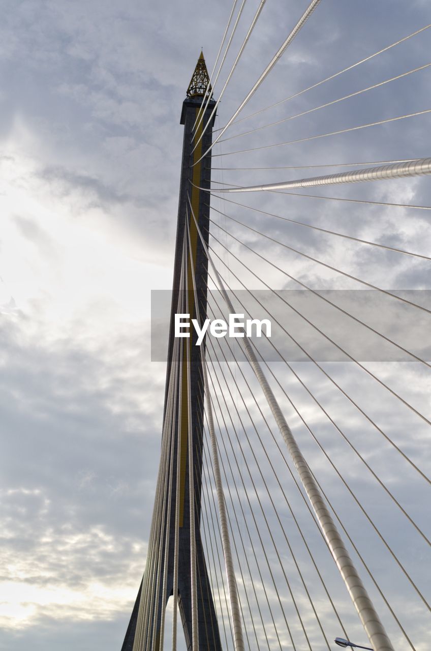 LOW ANGLE VIEW OF SUSPENSION BRIDGE AGAINST SKY