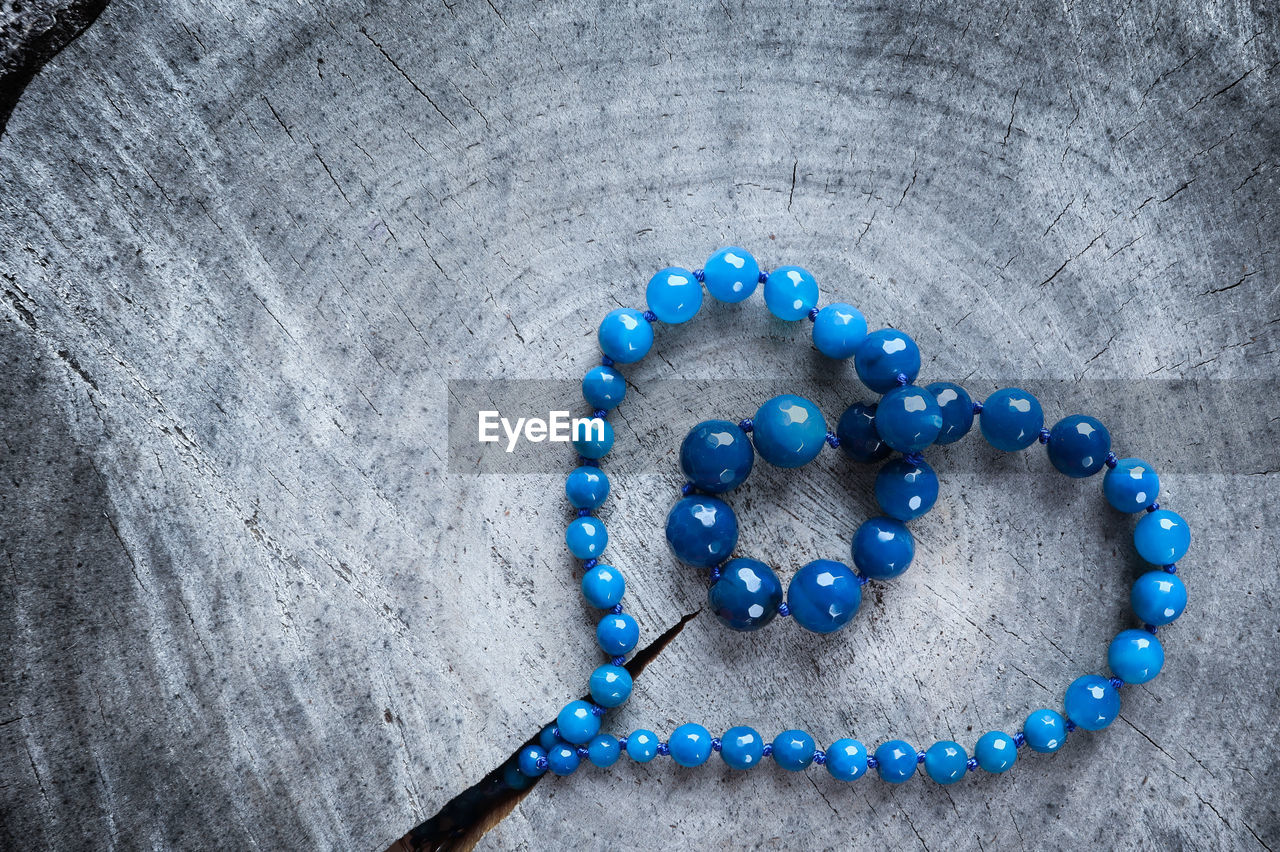 HIGH ANGLE VIEW OF HUMAN EYE WITH BLUE PAINTED