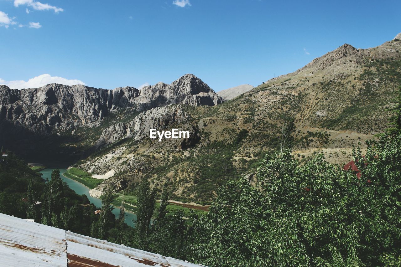 Scenic view of mountains against sky at kemaliye apcaga village