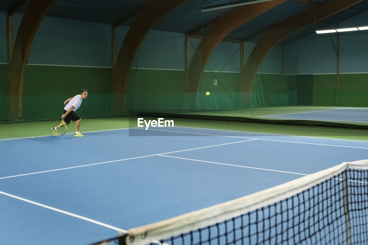 Man playing tennis