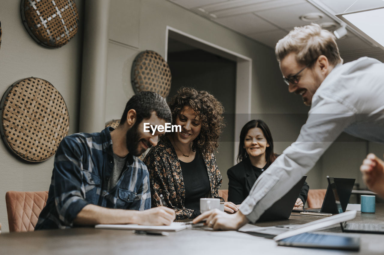 People talking during business meeting