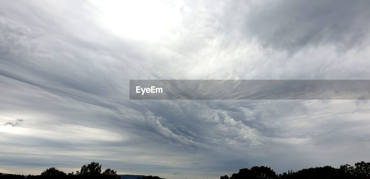 LOW ANGLE VIEW OF SKY OVER SILHOUETTE TREES