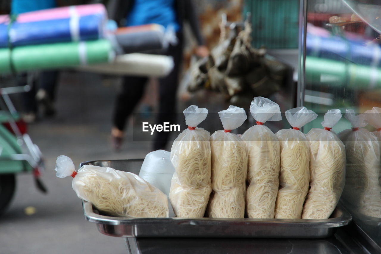 Bags of noodle for sale in market