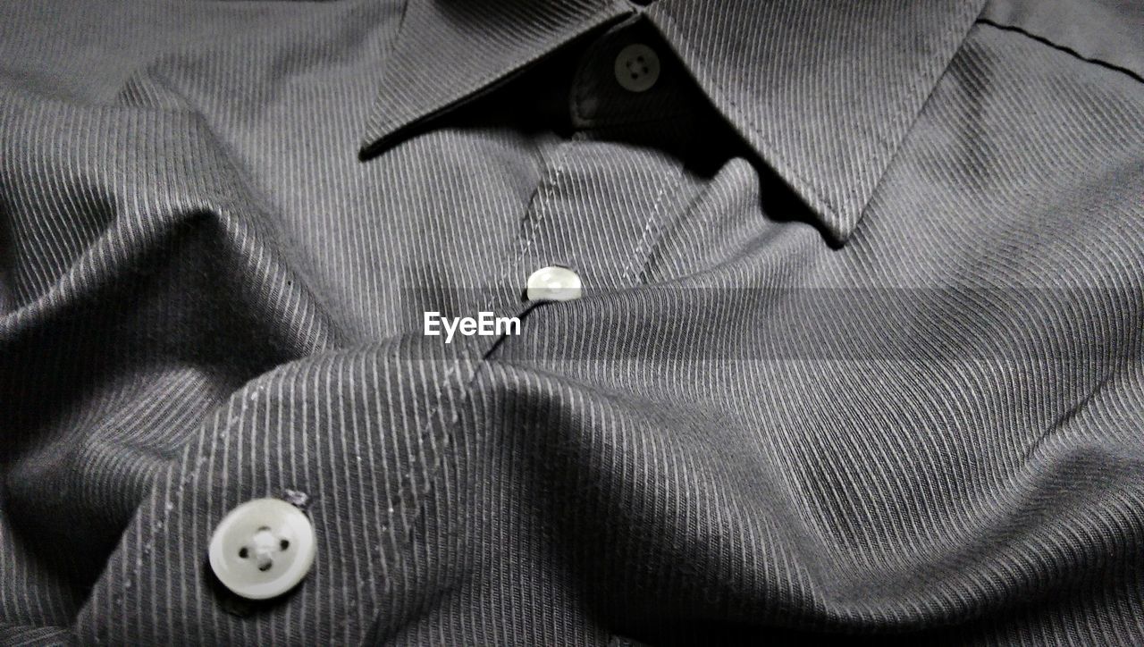 Close-up of button down shirt