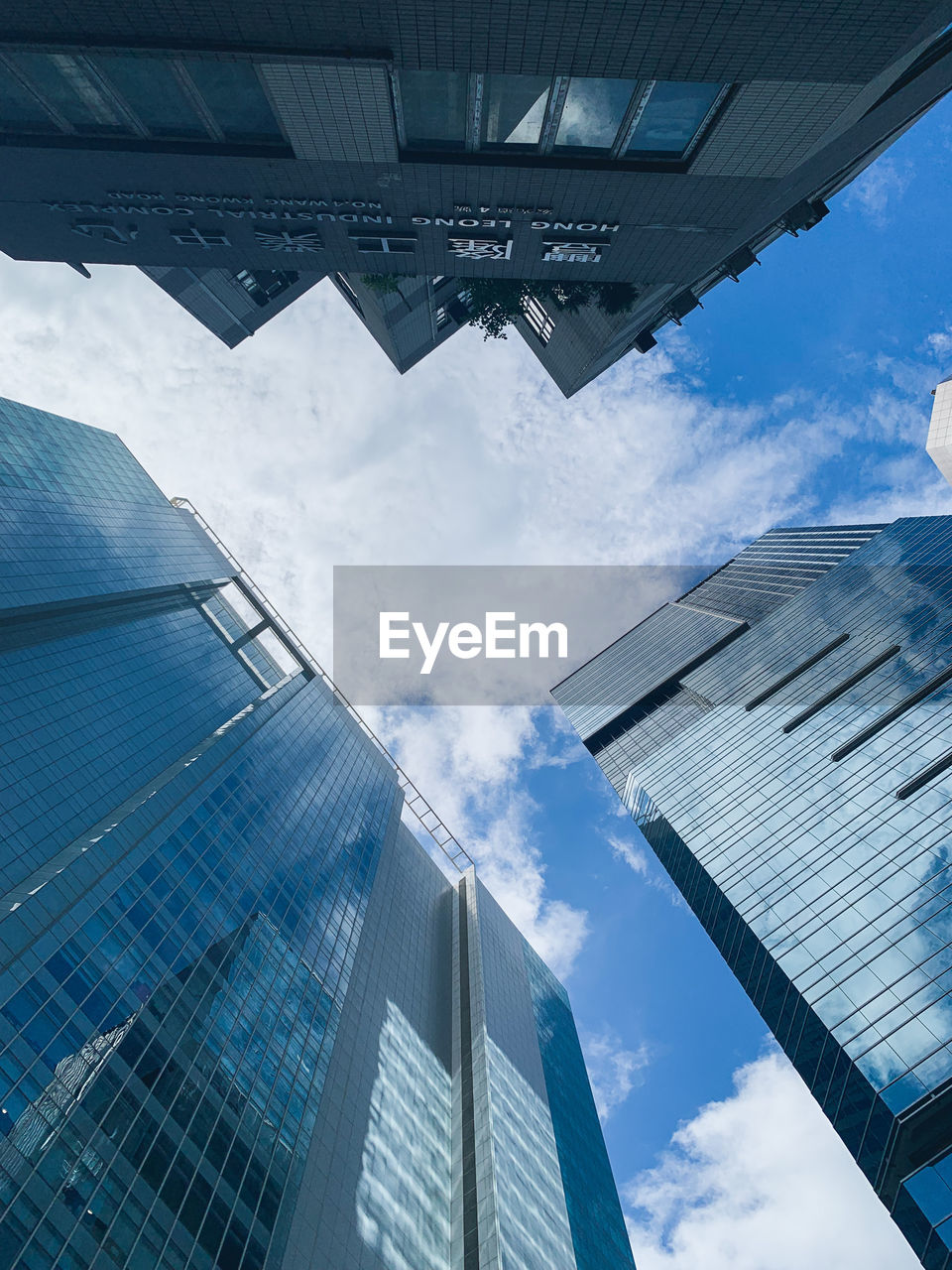 Low angle view of modern buildings against sky