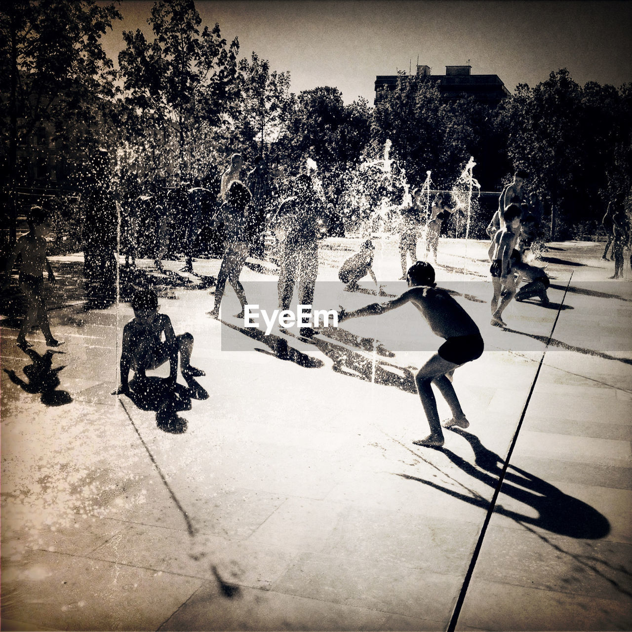 Children playing in fountain