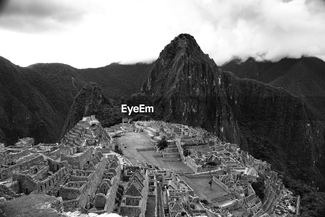 PANORAMIC VIEW OF RUINS AGAINST SKY