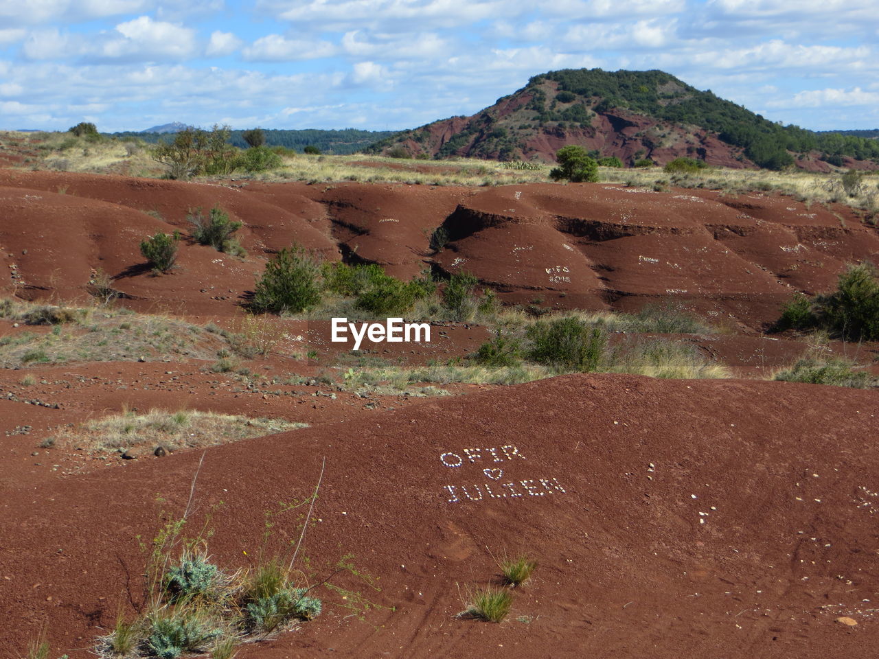 Scenic view of land against sky