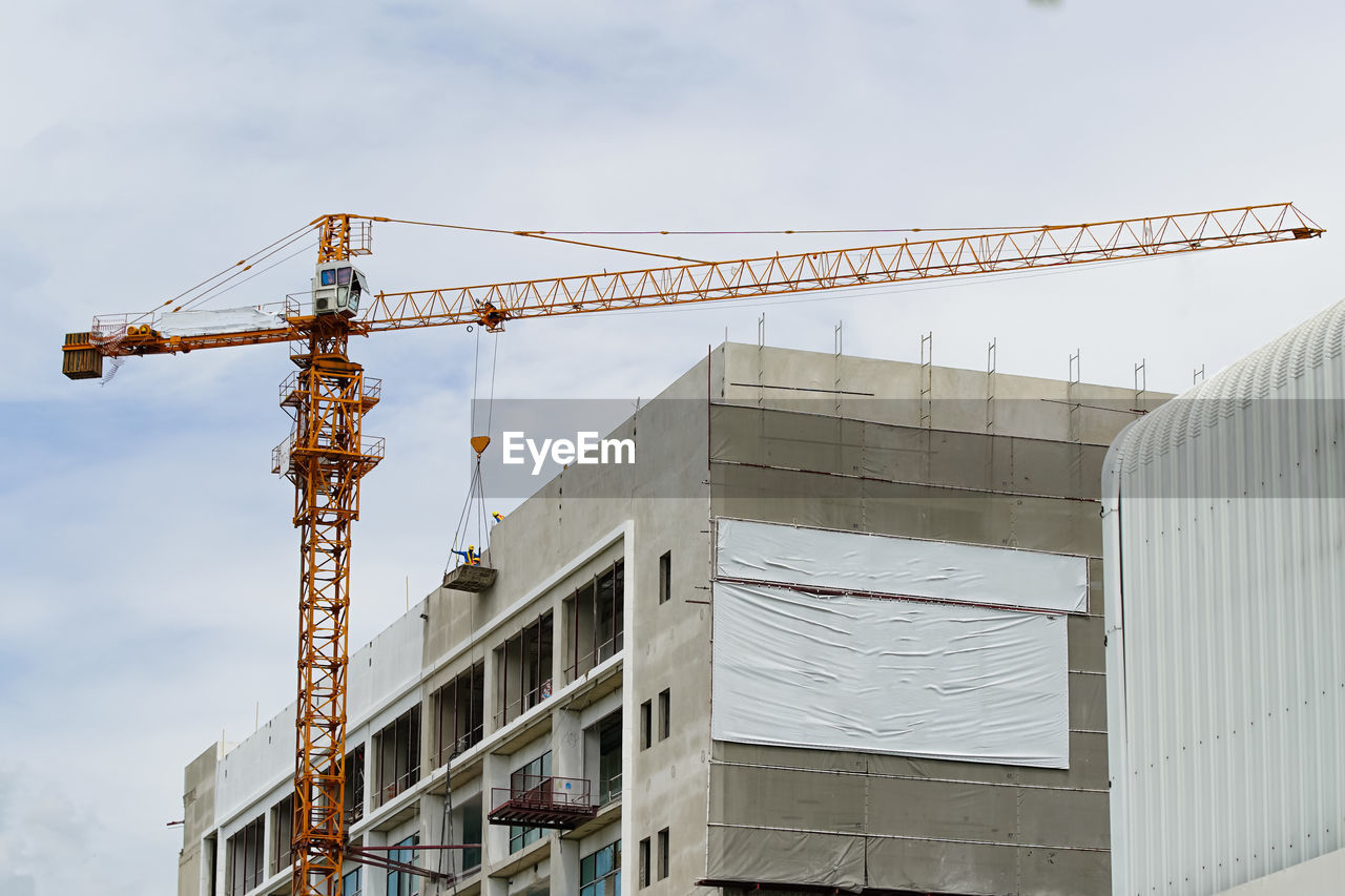 low angle view of crane against clear sky