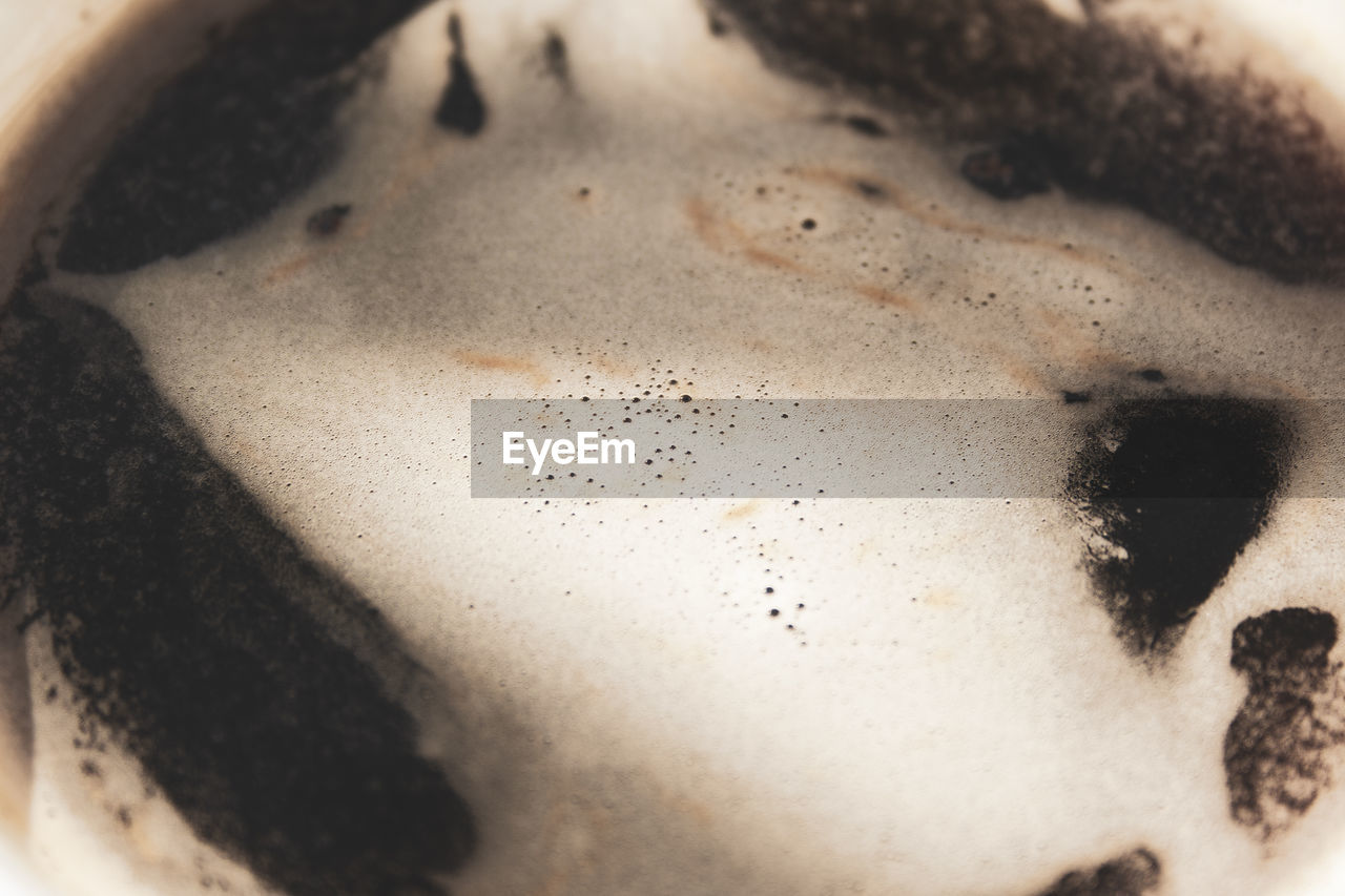 HIGH ANGLE VIEW OF COFFEE ON WHITE