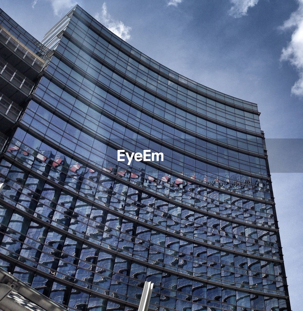 Low angle view of building glass facade