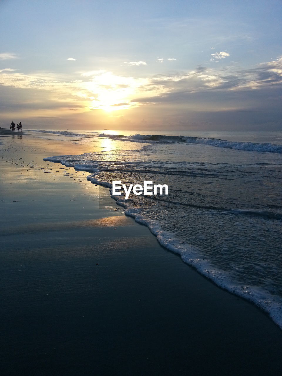 Scenic view of sea at sunset