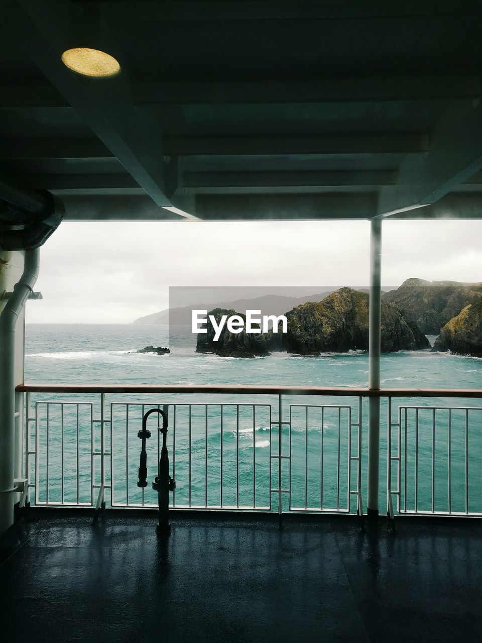 SCENIC VIEW OF SEA SEEN THROUGH BRIDGE