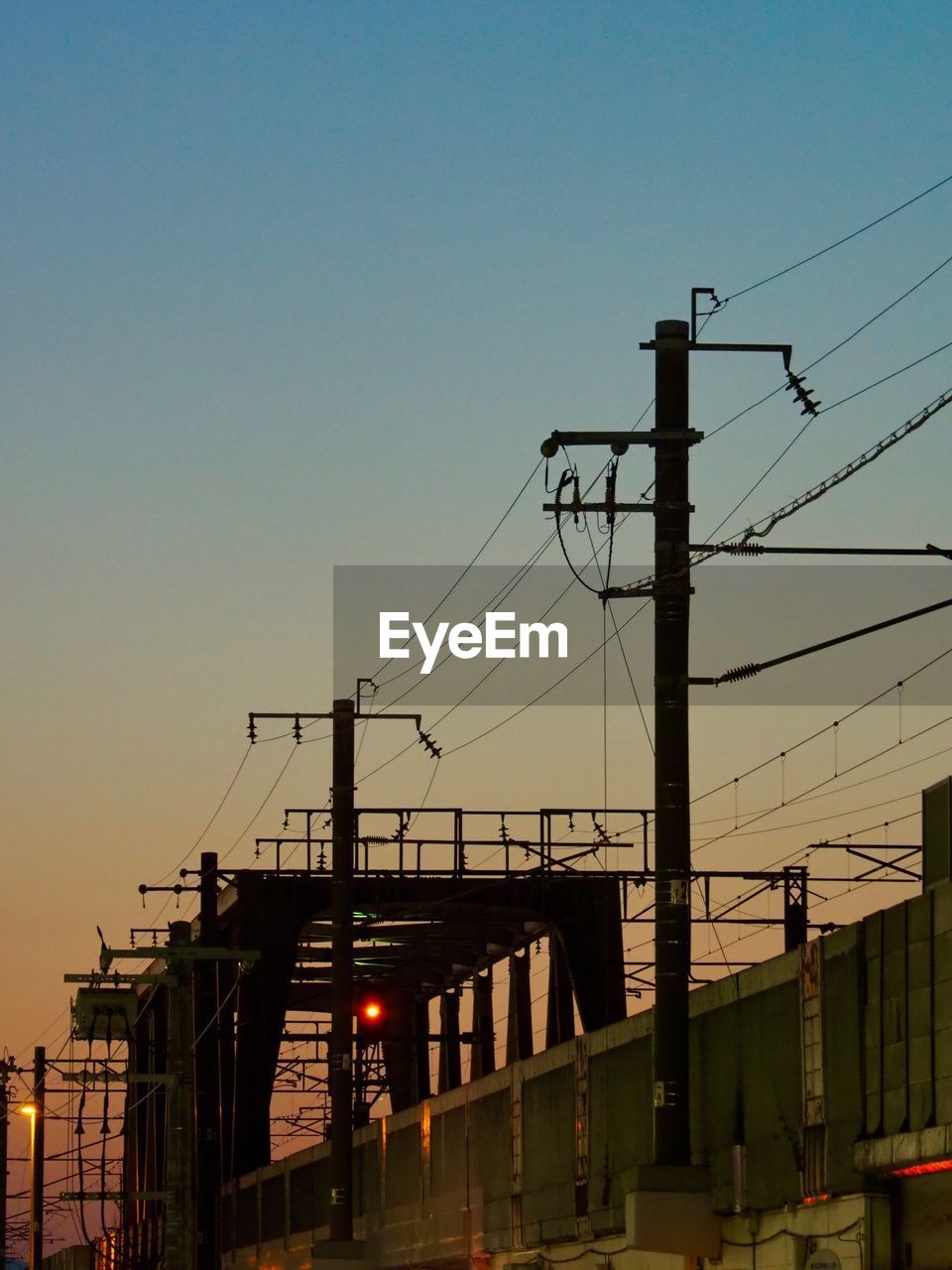 LOW ANGLE VIEW OF ELECTRICITY PYLON AGAINST SKY