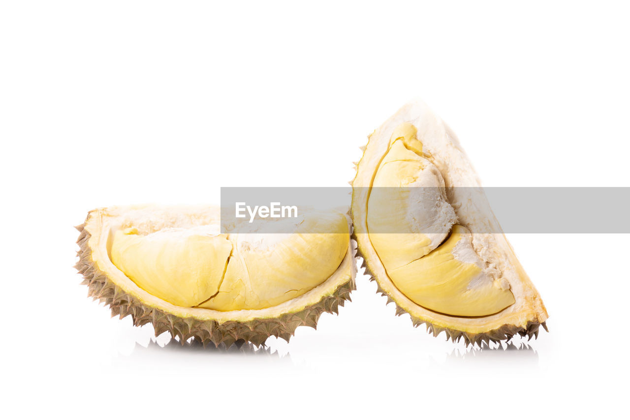 produce, white background, fruit, food, cut out, food and drink, studio shot, healthy eating, no people, footwear, wellbeing, indoors, plant, freshness, yellow, two objects