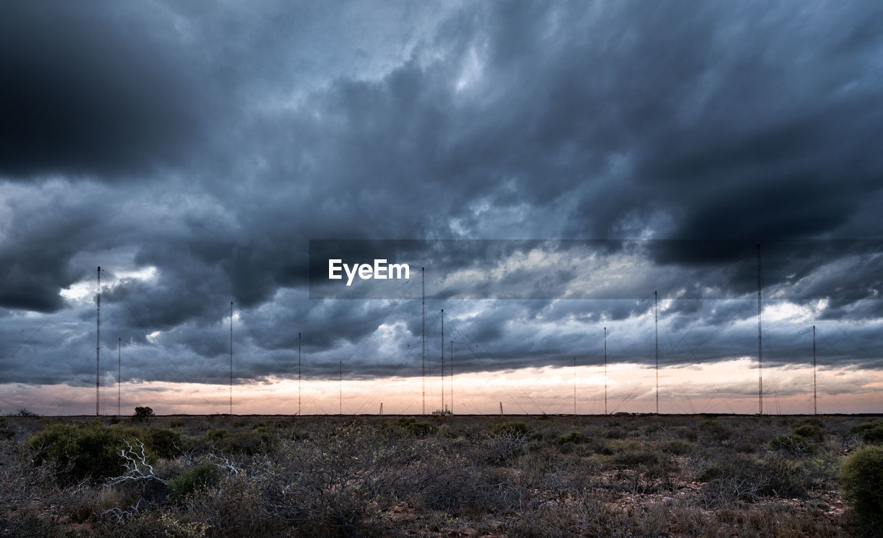 STORM CLOUDS OVER FIELD