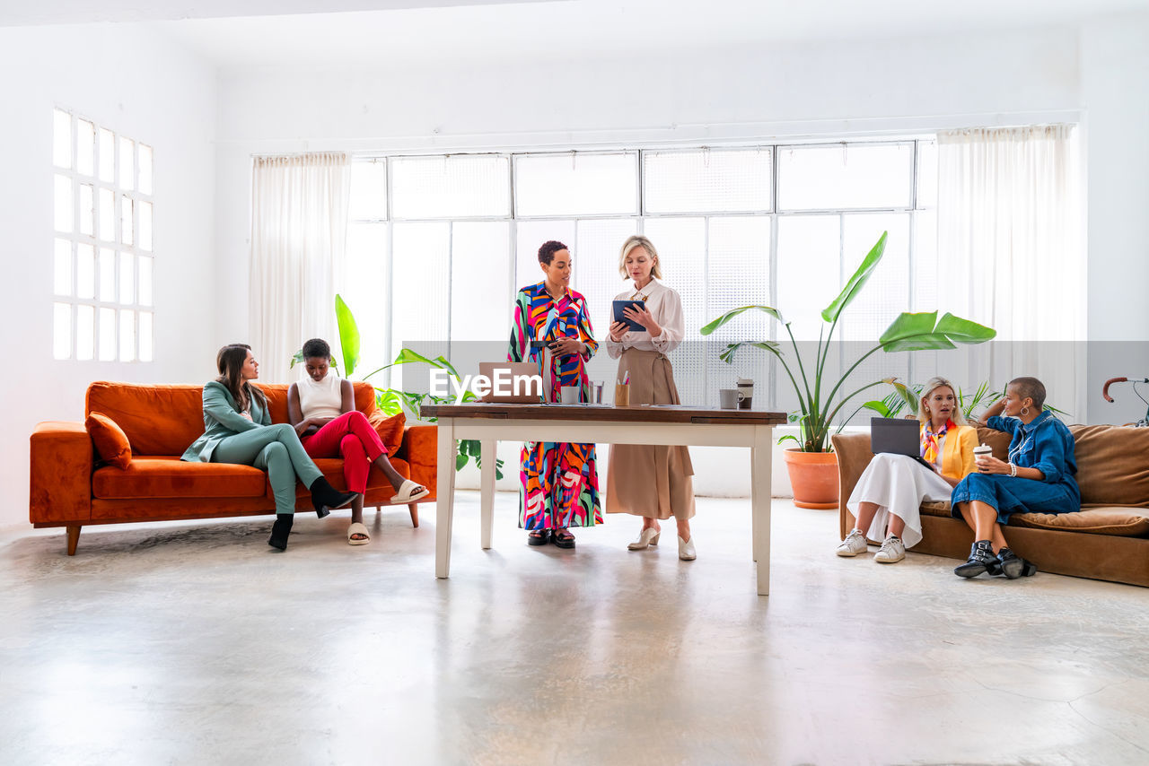 group of people sitting on table