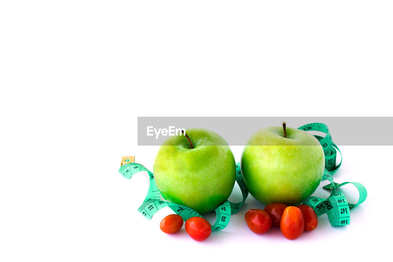 Close-up of apples on white background 