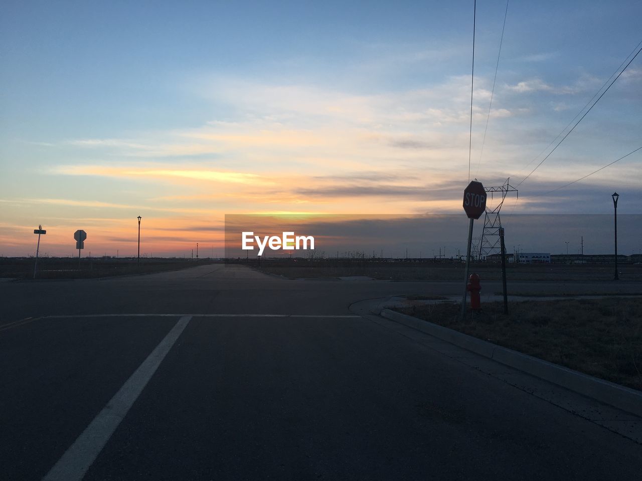 Road against sky during sunset