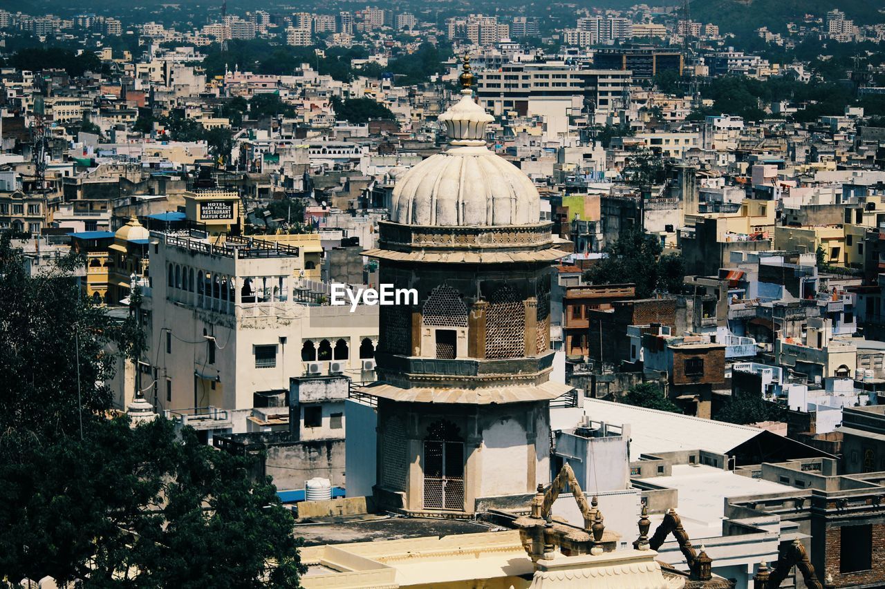 HIGH ANGLE VIEW OF CROWDED CITY BUILDINGS