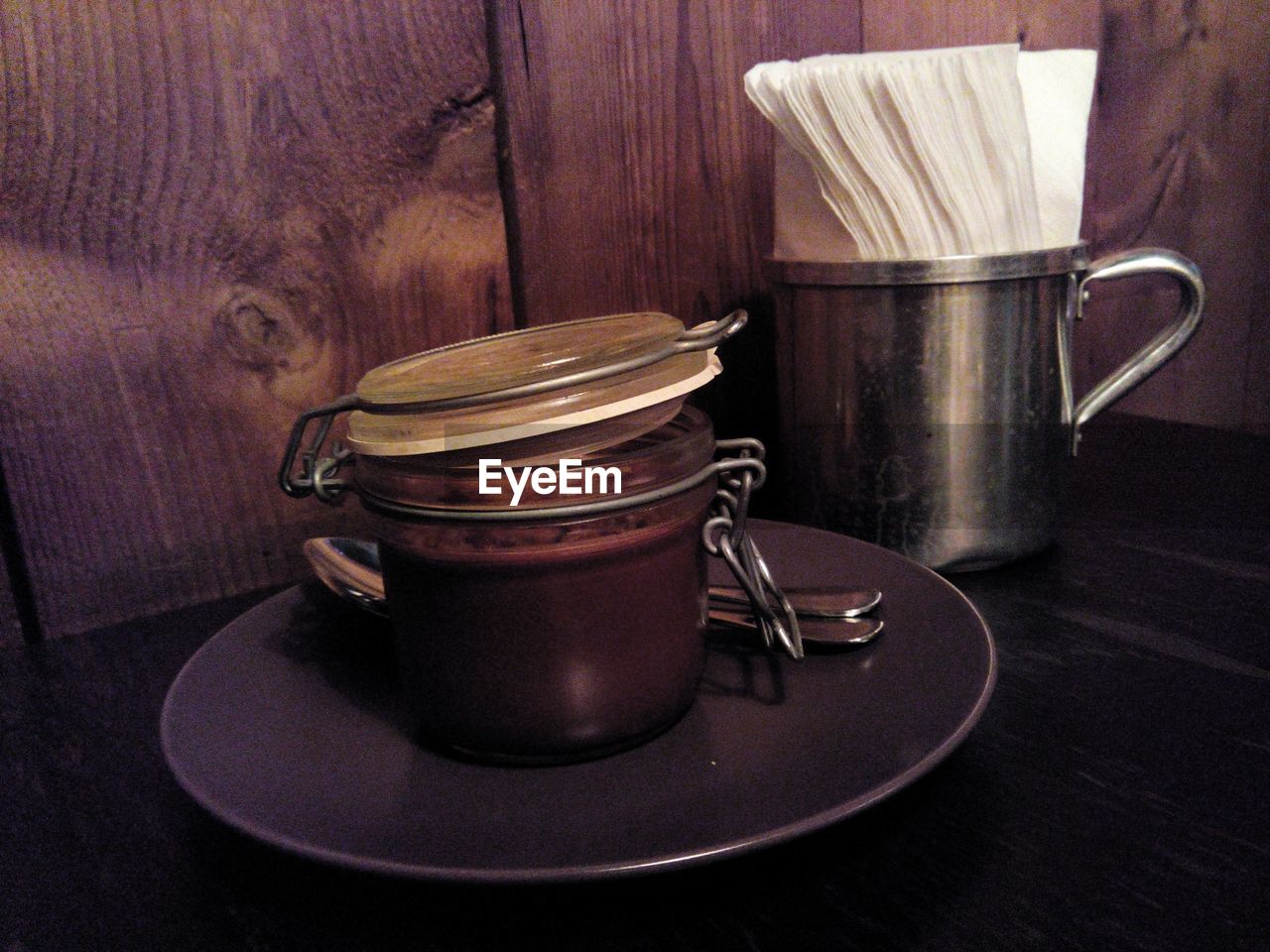 Close-up of chocolate in container on restaurant table